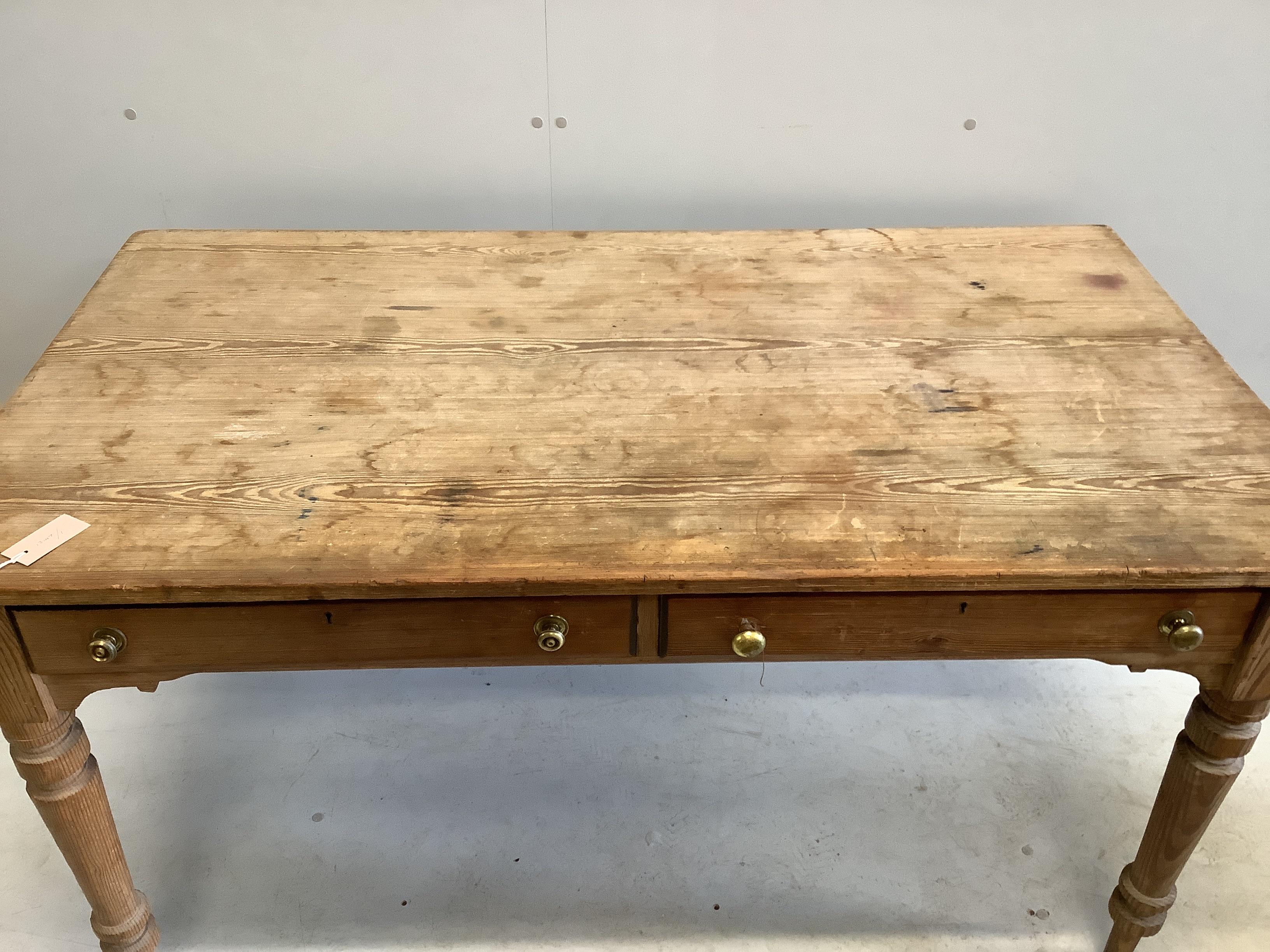 A Victorian pitch pine two drawer rectangular kitchen table, width 137cm, depth 75cm, height 76cm